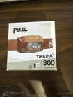 Petzl Tikkina Red Hybrid Led Headlamp 300 Lumens Brand New!!. Price: $24.99.