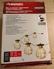 Husky 50 Ft. 5-SOCKET String Caged Work Lights New Open. Price: $35.00.