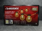 Husky 50 Ft. 5-SOCKET String Caged Work Lights Open. Price: $40.99.