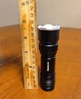 Black Tasco Led Flashlight 4.5" Tested, Works Fine Used. Price: $8.99.