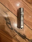 Rovyvon A4 Pro Titanium Keychain Flashlight, 650 Lumens. Used. Price: $45.95.