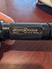 Surefire 6P Defender Flashlight Attack Head Aluminum Black A294154 Open. Price: $103.50.