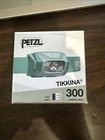 Petzl Tikkina Green Hybrid Led Headlamp 300 Lumens Brand New!!. Price: $24.99.