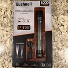 Bushnell 2000 Lumen Rechargeable Flashlight Nib New. Price: $60.00.