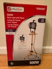 New Utilitech Model #0394367 Halogen 500W Work Light With Tripod 6' Cord. Price: $40.00.