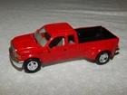 Racing Champions Mint 1999 Ford F-350 Dually Pickup Red 1998 (#165) Used. Price: $14.50.