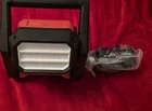 Milwaukee Work Light: M18 Light/flood, New Xc 6.0 Lithium Forge Battery Open. Price: $199.99.