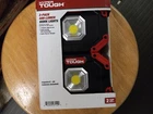 Hyper Tough 400-LUMEN 2-PK Led Work Lights 180 Foldable Handle Battery Operated Open. Price: $18.00.