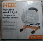 Hdx 250-WATT Halogen Portable Work Light With Led Bulb Open. Price: $24.95.