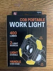 New Cob Portable Work Light 400 Lumen 2 Sources. Price: $6.00.
