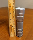 Silver Tasco Led Flashlight 4.5" Tested, Works Fine Used. Price: $8.99.