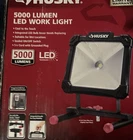 Husky 5000 Lm Led Portable Corded Work Light 120V W/ Ft Open. Price: $34.99.