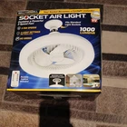 New! Bell+howell Socket Air Light And Fan With Remote. Price: $30.00.