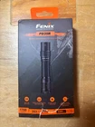 Fenix PD35R Compact Rechargeable Tactical Flashlight With Holster New. Price: $75.00.