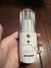 Sylvania Re-chargeable Flashlight And Night E12168 Used. Price: $12.99.