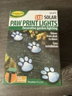 Led Solar Paw Print Lights Set Of 4 Decorative Garden Ideaworks New. Price: $24.99.