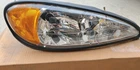 Nos Rh Headlight Headlamp Halogen W/bulb Pontiac Grand 99 01 02 03 04 2005 Used. Price: $60.00.