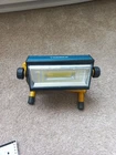 Tresda 100W Rechargeable Led Work Lights, Waterproof Camping, Hiking, Job Site Used. Price: $45.00.