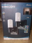 New Westek Battery Operated 2 Pack Wall Sconce Led Lights W/ Remote Matte Black. Price: $24.99.