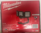 New Milwaukee 2368-20 Dual Power Triple-panel Flood Light. Price: $145.00.