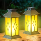 2PACK Patina 13" Metal & Glass Solar Lantern With Flickering Flame, Outdoor W... New. Price: $62.01.