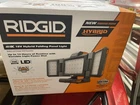 Ridgid R8694221B 18-VOLT Hybrid Folding Panel Light 01P2,TOOL Only, New. Price: $99.00.