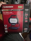 Husky Led 6000 Lumens Hybrid Rechargeable Work Light Open. Price: $68.00.