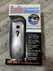 The Illuminator Emergency Radio Flashlight Batteries /no Power Needed-bin 3 New. Price: $16.50.