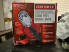 Craftsman Retractable 20-FT Cord Reel Drop Work Light W/handle Outlet 73942 New. Price: $65.00.