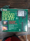 Woods 150 Watt Halogen Stake Light 6FT Cord Open Box 1998. Price: $11.99.