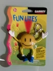 Garrity Fun Lites Smiley Face Keychain New Low Battery Packaging Wear Used. Price: $7.52.