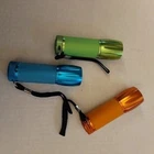 Set Of 3 Mini Led Flashlights W/wrist Straps Green Blue & Orange Aluminum New. Price: $20.00.