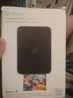 Lifeprint Portable 3" X 4.5" Photo Video Printer For Iphone Black LP002-2 Open. Price: $30.00.