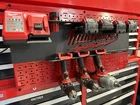 Milwaukee M18 M12 Power Tool / Battery Holder + Charger Stand New. Price: $149.00.