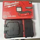 New Milwaukee M12 Packout Flood Light With Usb Charging (2356-20) Tool Only. Price: $79.99.